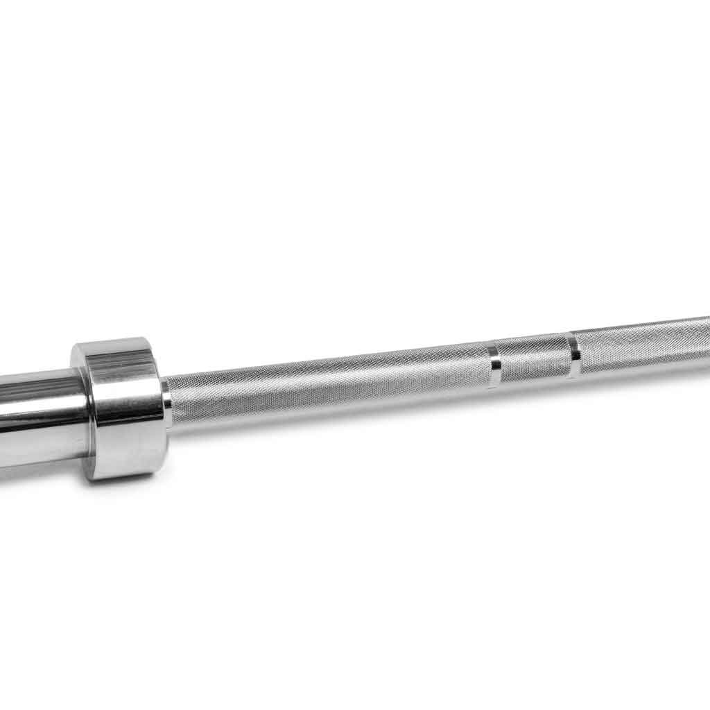 Close up of Barbell Standard 1000 barbell shaft with precision knurling and smooth chrome sleeve