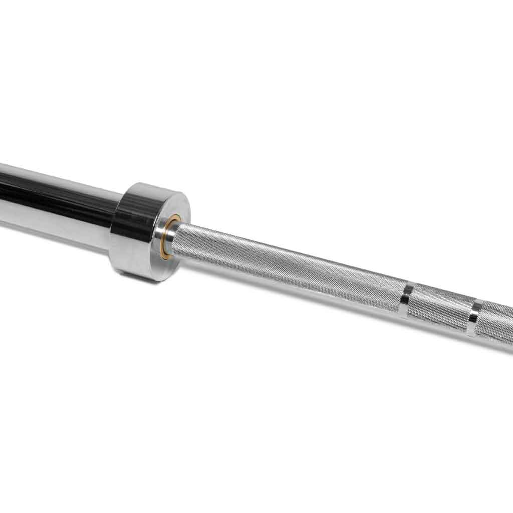 Close-up of Barbell Standard 1500 Olympic Bar sleeve and knurling, chrome finish with smooth spin.