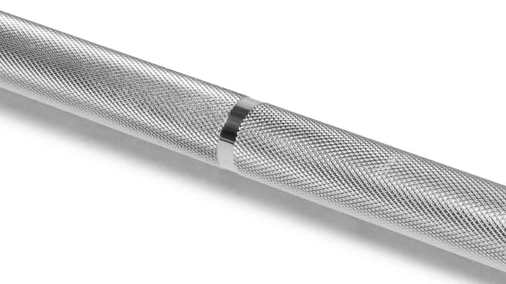 Barbell Standard 2000 barbell close up of precision knurled grip with center ring for secure weightlifting hold