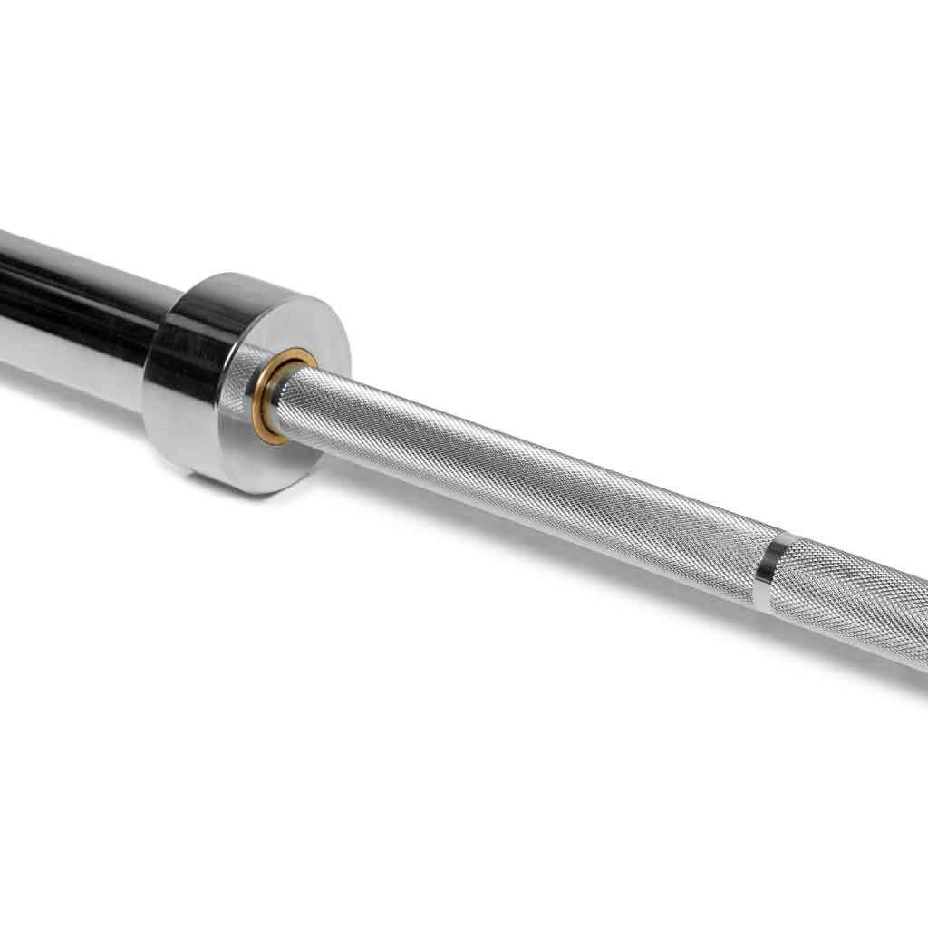Close-up of Barbell Standard Olympic barbell sleeve with bronze bushing and medium knurl shaft
