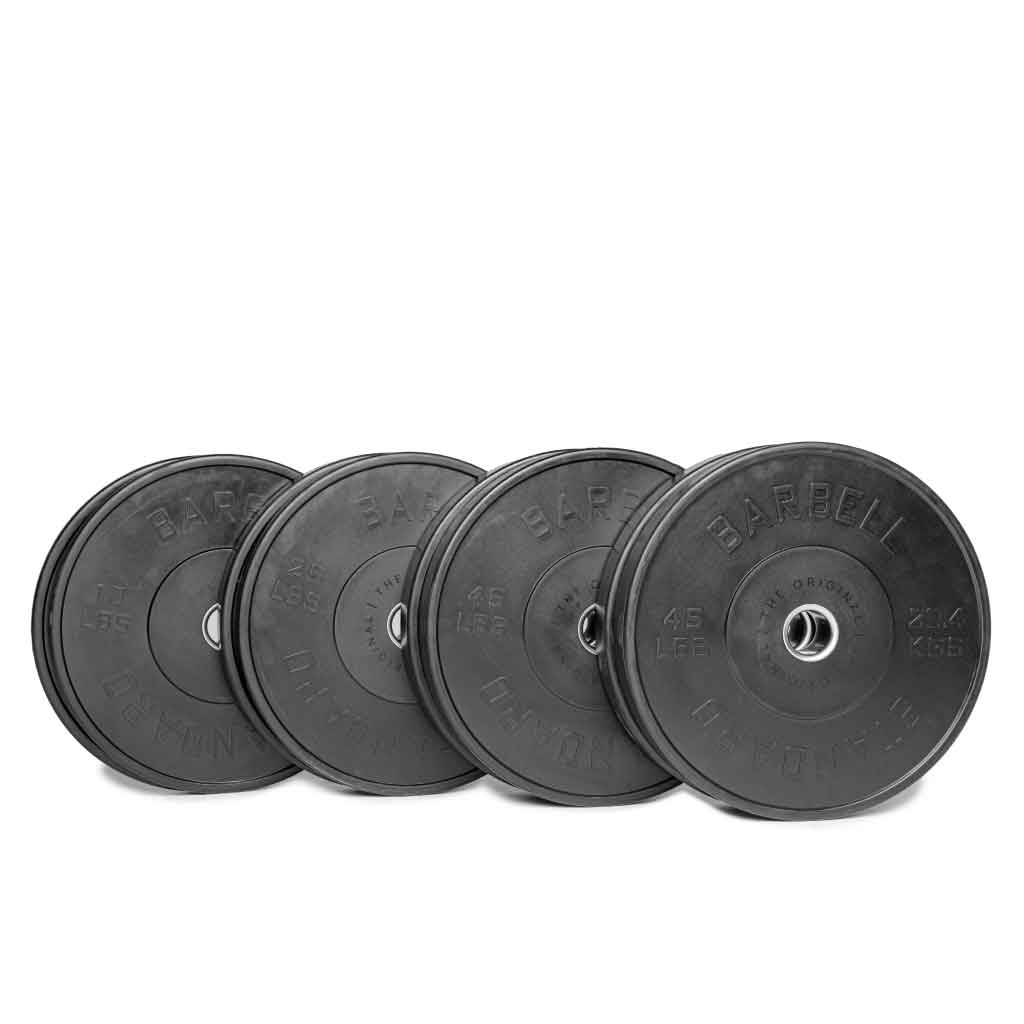 A set of black Olympic bumper plates with raised lettering and the Barbell Standard logo on the center.