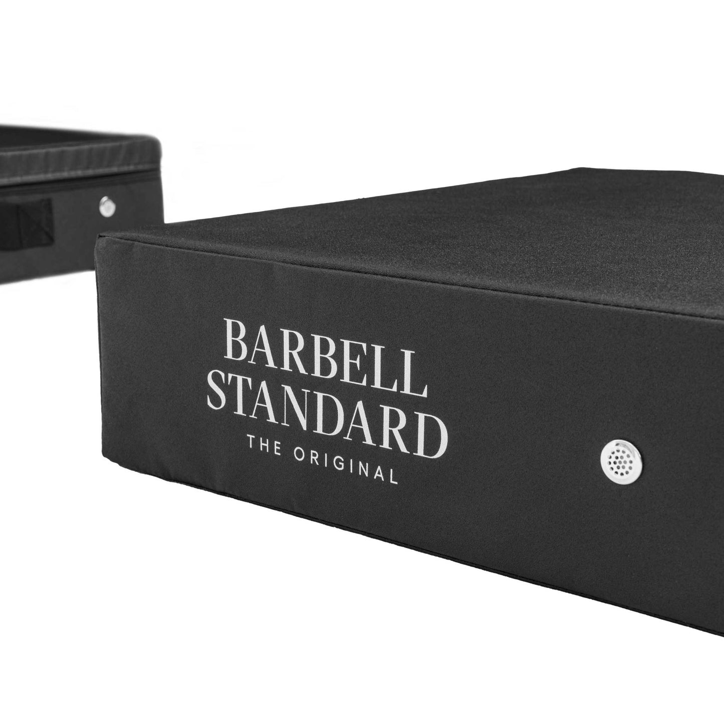 Close-up of Barbell Standard drop pad showing logo and durable black cover