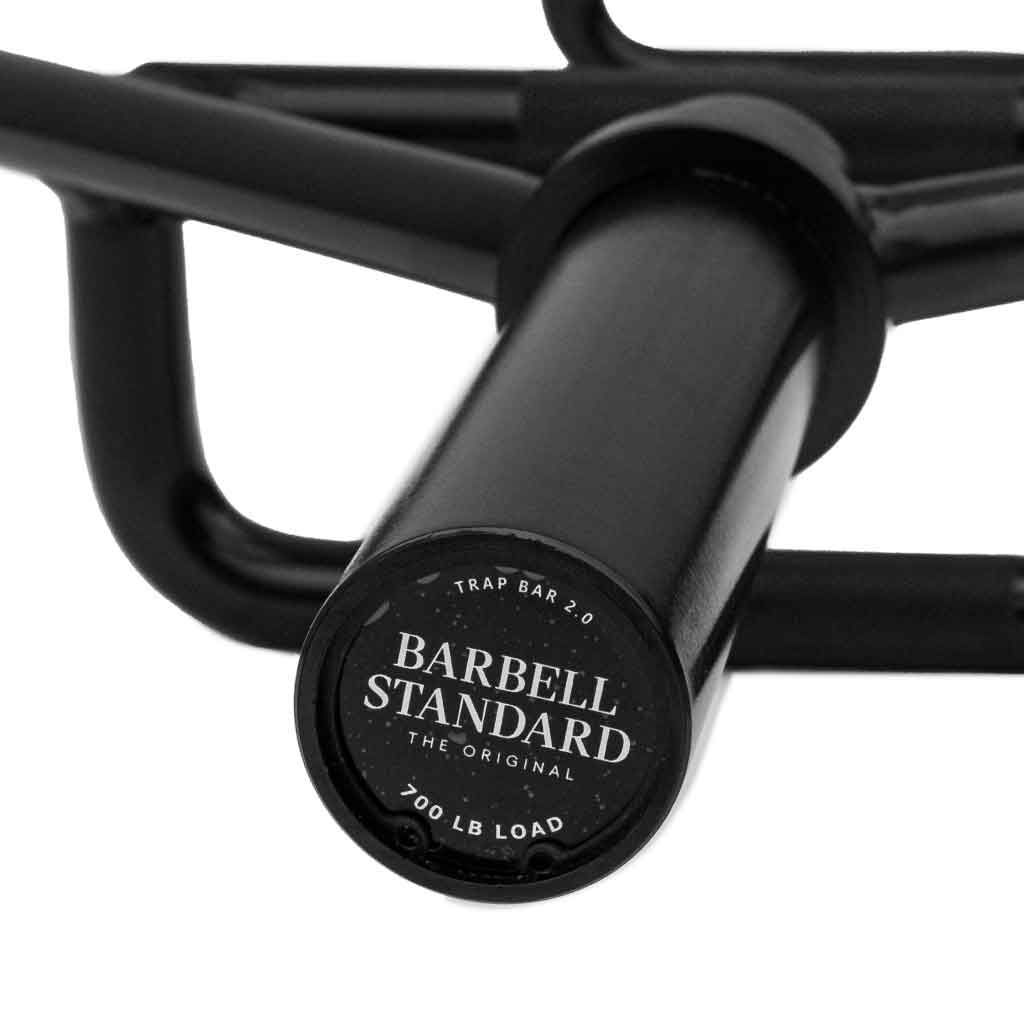 Close-up of Barbell Standard Trap Bar 2.0 end cap with logo and 700 lb load rating