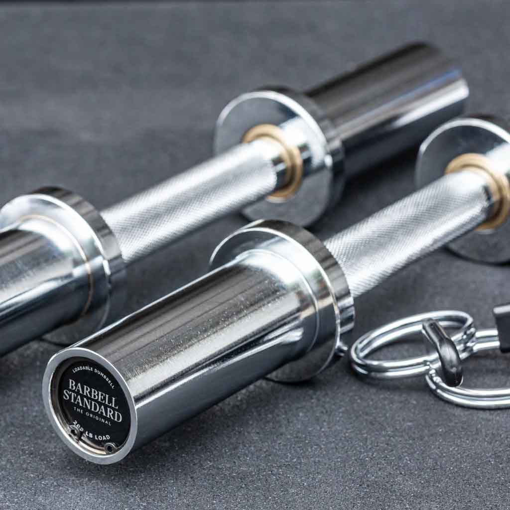 Barbell Standard loadable Olympic dumbbells with knurled grip handles and spring collars for secure weight training