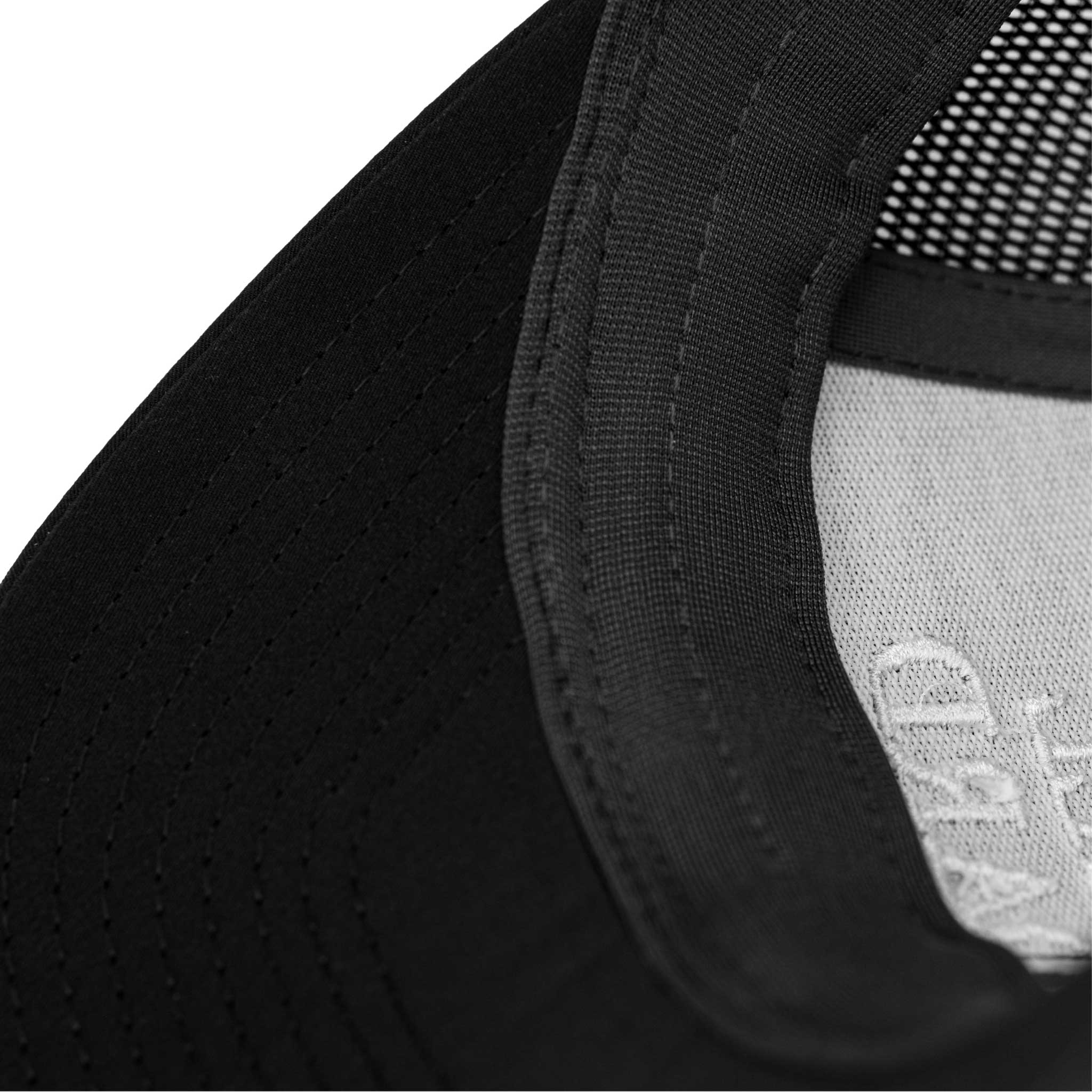 Close-up of the Barbell Standard performance hat sweatband and stitching detail inside the cap.