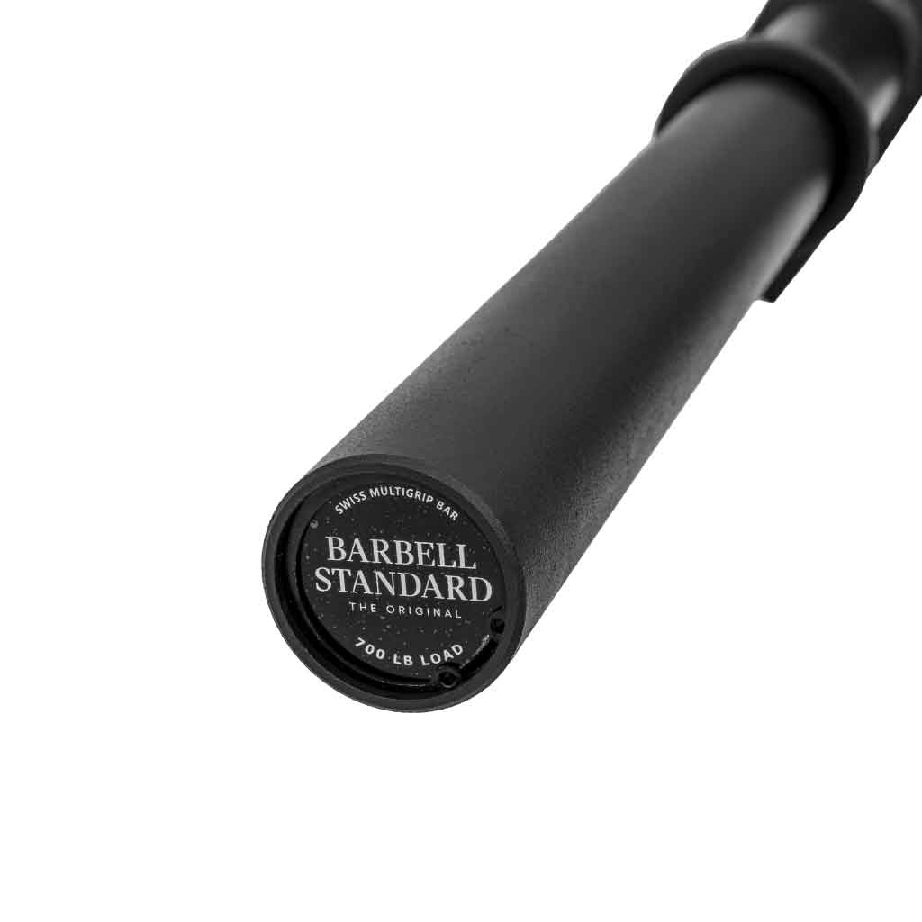 Close-up of Swiss Multigrip Bar sleeve endcap showing Barbell Standard logo and 700 lb load rating