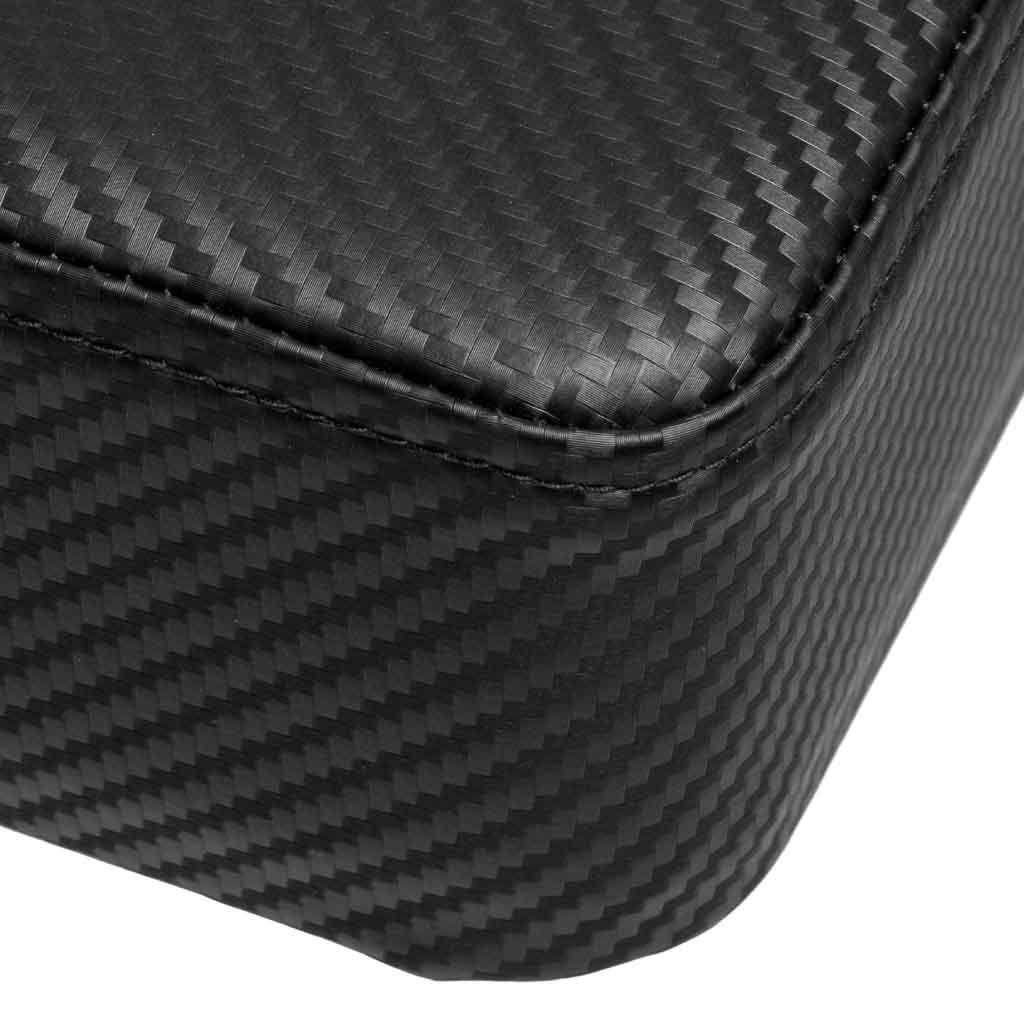 Closeup of Barbell Standard weight bench corner with carbon fiber textured upholstery and durable stitching