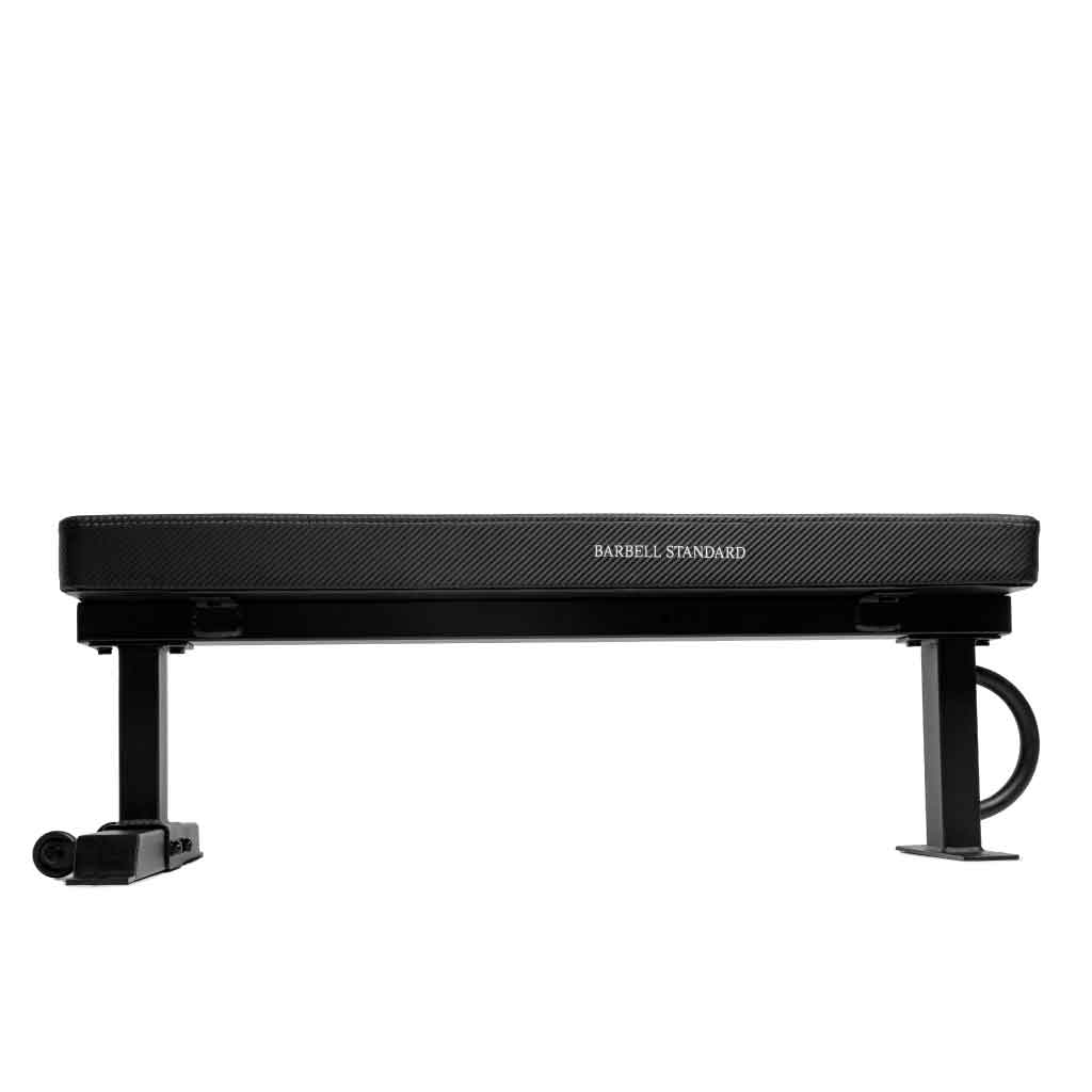 Barbell Standard competition flat weight bench with carbon fiber pad, front profile showing steel frame, handle, and wheels